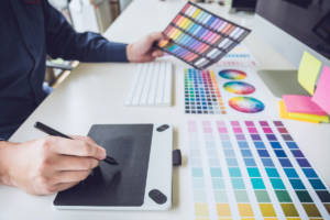 person working with color theory at desk