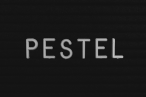 black background with capitalized wording that reads "pestel"